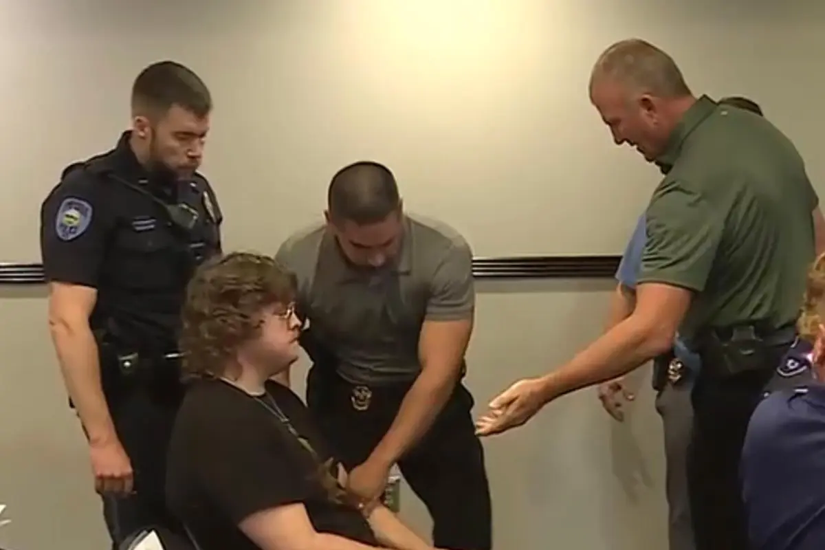 Kansas Teacher Arrested for Clapping at Data Center Meeting